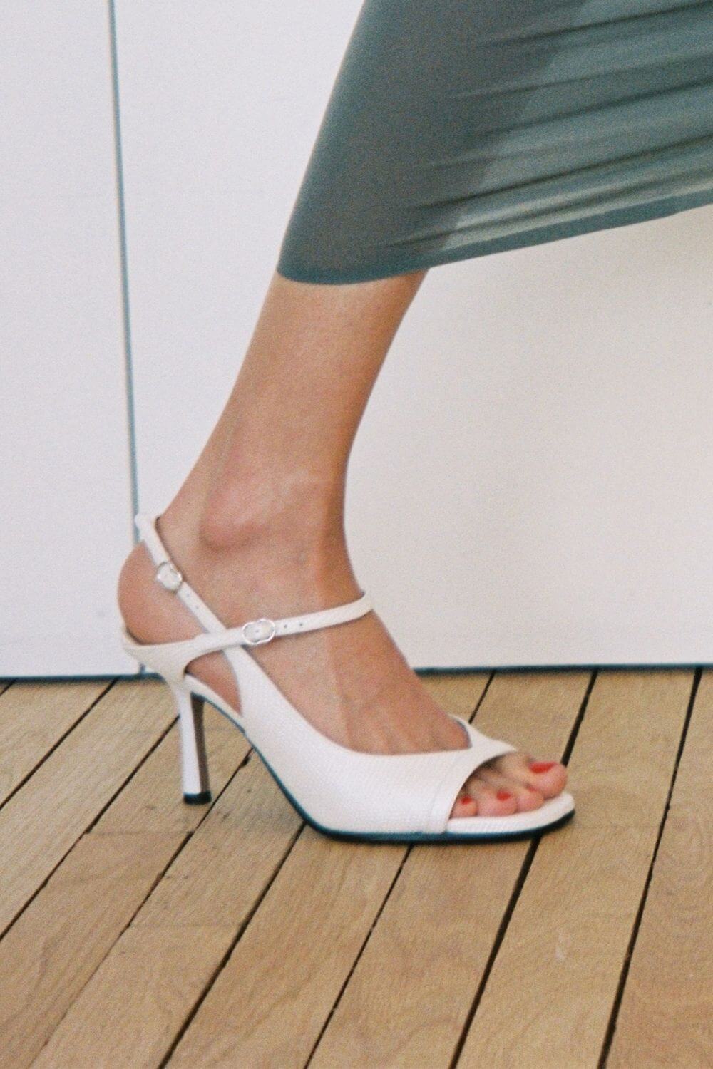 Tacchi a spillo slingback effetto serpente Nero a punta aperta