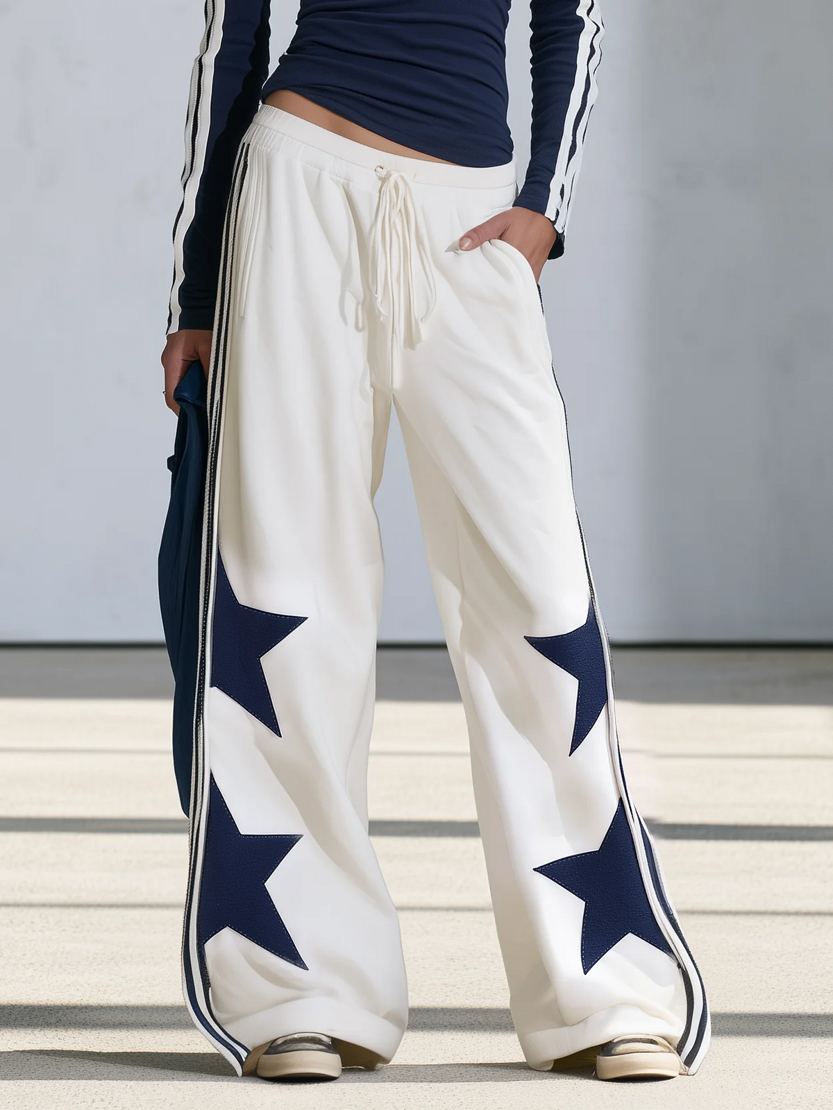 Claudia | Complete with long-sleeve top featuring navy blue star print and wide-leg trousers